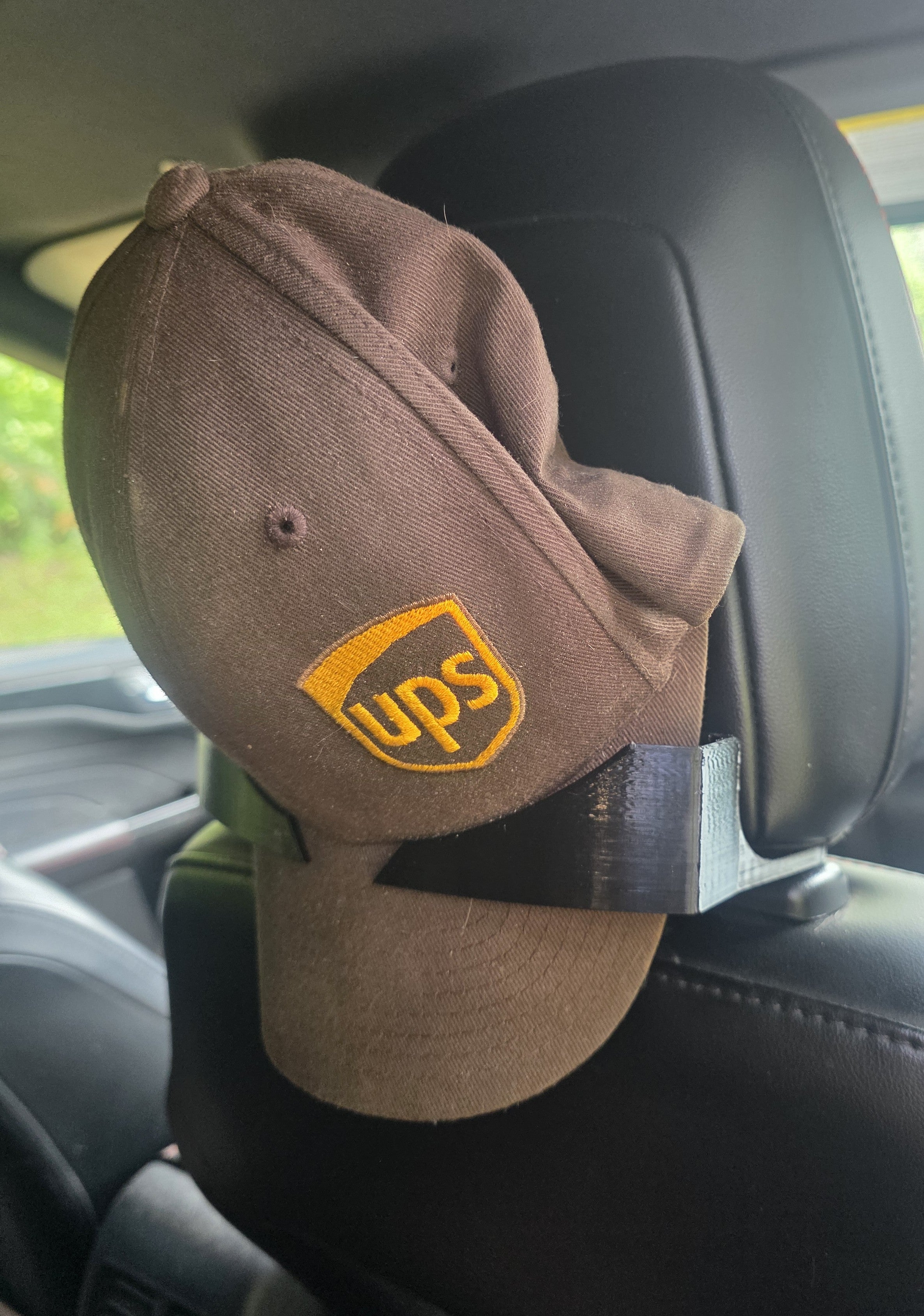 The Cap Buddy Headrest Hat Hanger