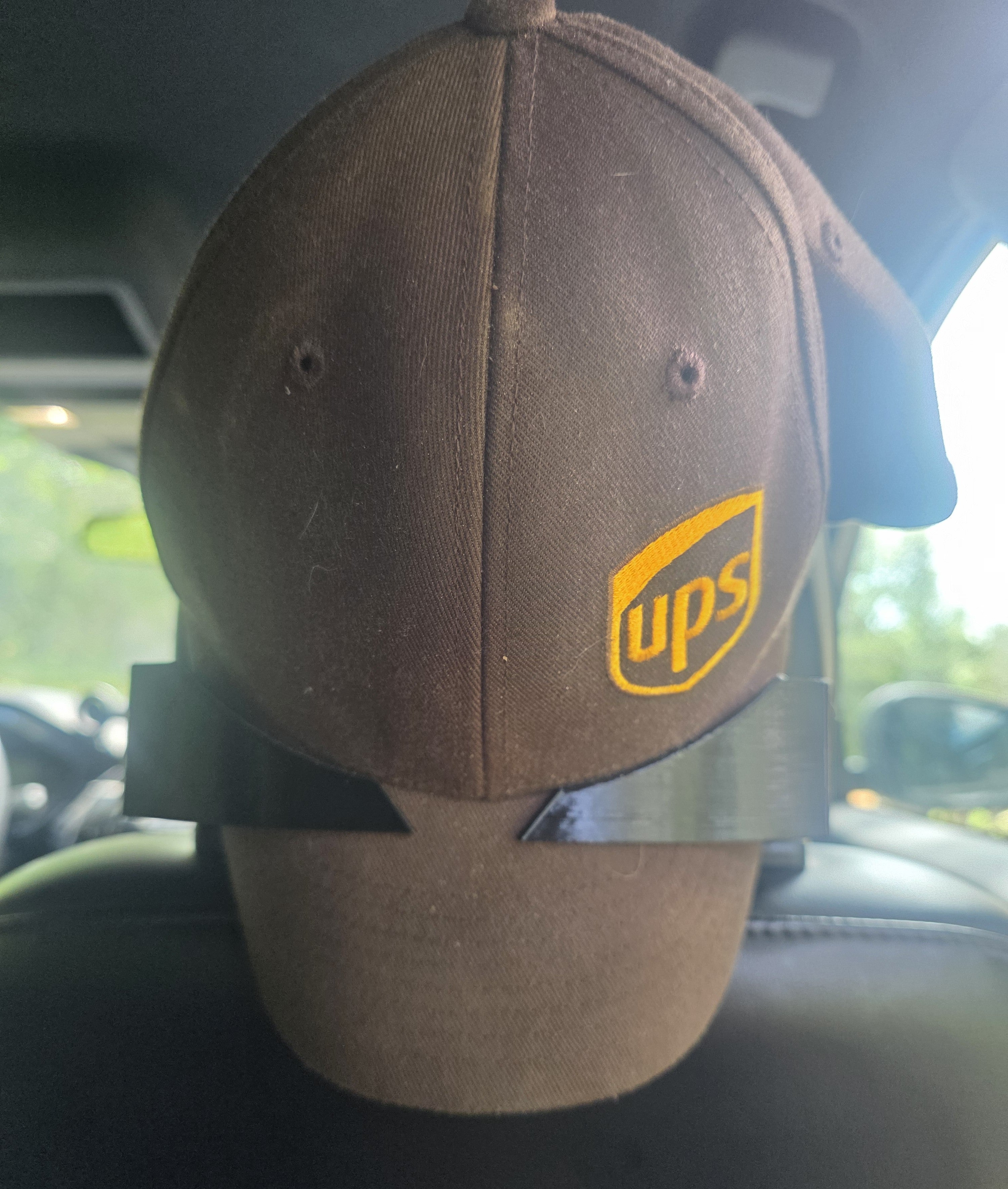 The Cap Buddy Headrest Hat Hanger