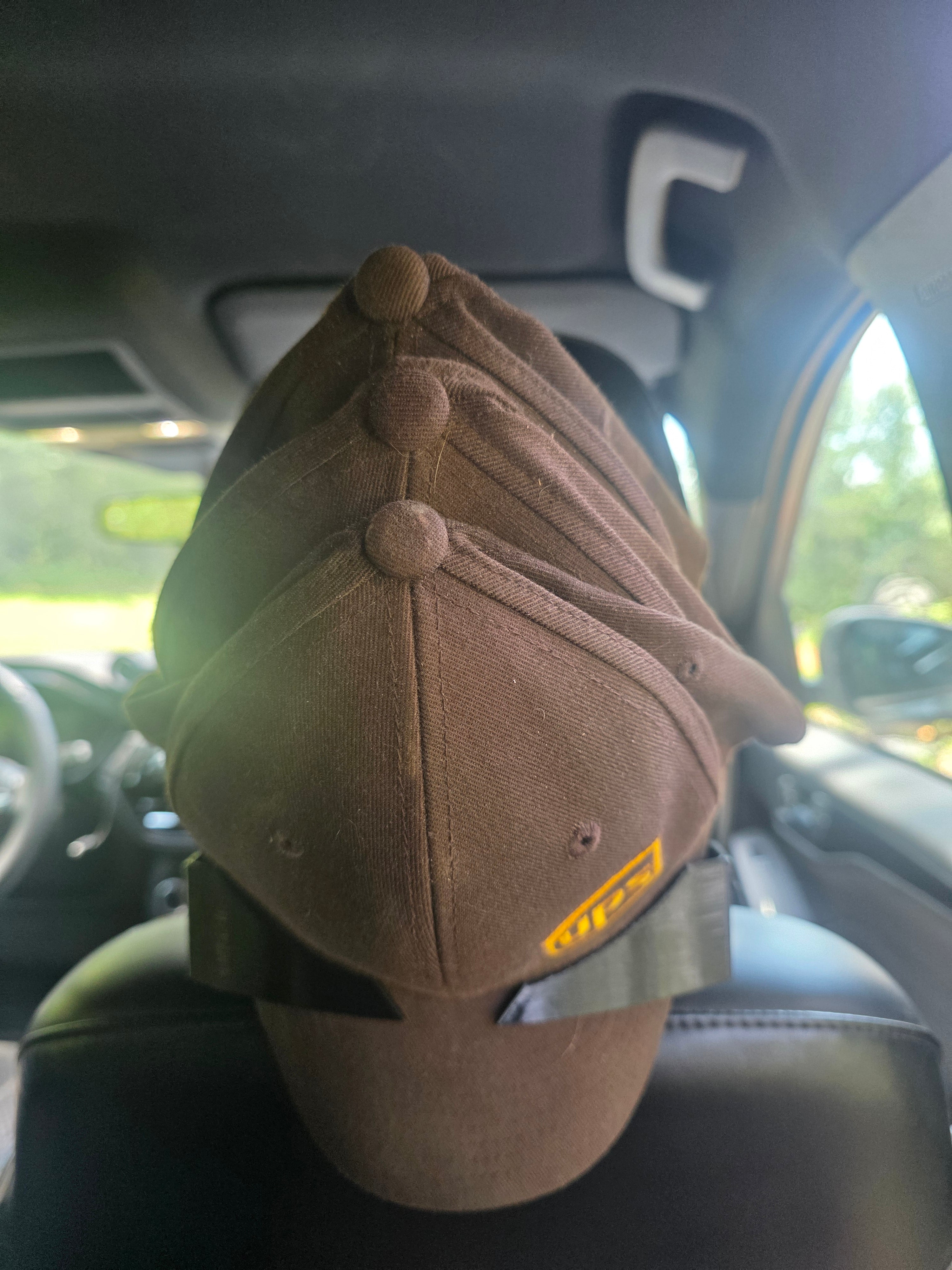 The Cap Buddy Headrest Hat Hanger